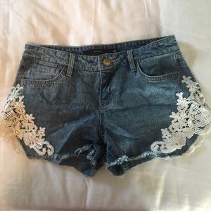 Lace-trimmed jean shorts